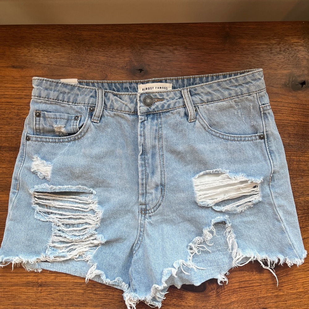 Almost famous light washed ripped bootie shorts size 7 cotton blend